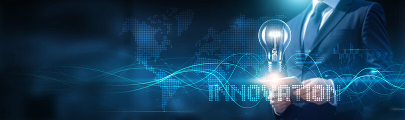 Innovation. Businessman using tablet on innovative global network connection on digital and modern with advanced data and development of cutting-edge technology and creative solutions.