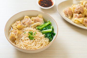 egg noodles with pork wonton soup or pork dumplings soup and vegetable