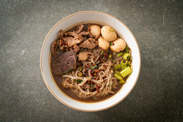 Thai noodle with pork, stewed pork, meatball and pork liver in blood soup