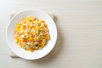 fried rice with mixed vegetable (carrot, green bean peas, corn) and egg