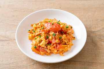 Stir-fried tomatoes with egg or Scrambled eggs with tomatoes