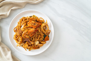 stir fried Tom Yum seafood dried spaghetti