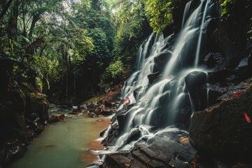 Bali waterfall Kanto Lampo Waterfall one of the most beautiful tropical waterfalls in tropical rainforest jungle near Ubud, Bali Indonesia