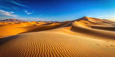 Naklejka premium Desert sand dunes under a clear blue sky, desert, sand, dunes, landscape, nature, arid, dry, hot, wilderness, scenic