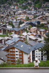 tourist go to travel in Zermatt to take a rest , walk ,hiking ,and see matterhorn mountain ,beautiful city viewpoint from top view Switzerland