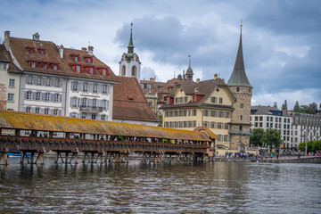 Fototapeta premium amazing beautiful city where tourist can see architecture old town city cow , river cruising wooden bridge at Lucerne Switzerland 