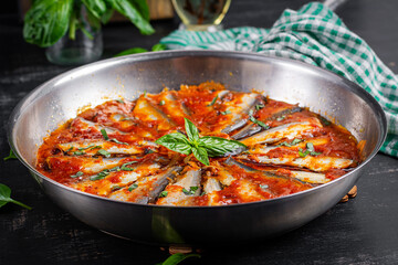 Sardines stewed in tomato sauce with spices. Lunch or dinner. Diet menu. Keto diet.