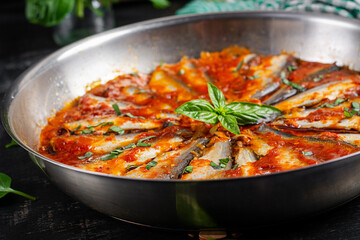 Sardines stewed in tomato sauce with spices. Lunch or dinner. Diet menu. Keto diet.