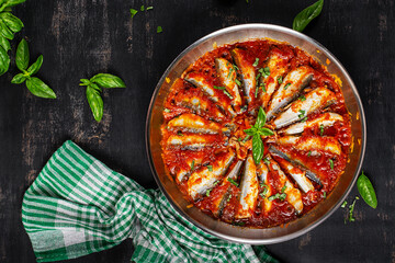 Sardines stewed in tomato sauce with spices. Lunch or dinner. Diet menu. Keto diet. Top view
