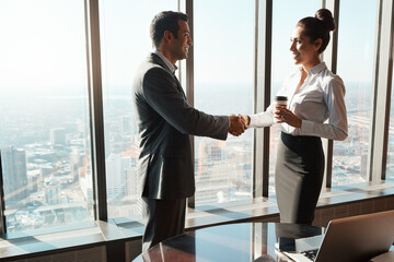Shaking hands, partnership and business people in office with deal, merger or b2b corporate team. Meeting, welcome and finance banker with investment client for agreement handshake in workplace.