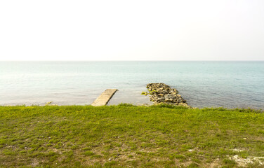 Stone breakwaters on the seashore