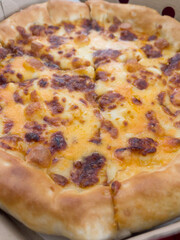 Pizza in a cardboard box