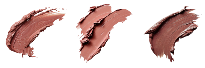 Close-up of three smears of nude lipstick, showcasing different textures and finishes on a white background. transparent background