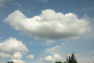 Clouds in the sky. Summer clouds. Warm weather.