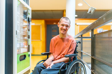 Man with cerebral palsy next to vending machine in coworking