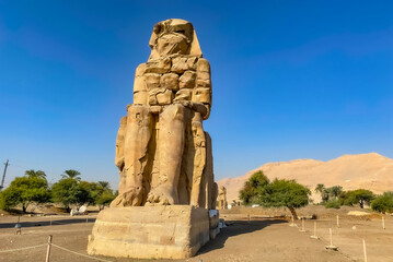 Colossi of Memnon, two massive stone statues representing the pharaoh, Luxor, Egypt