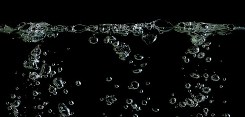 texture white water bubble isolated black background. concept of designing oxygen air underwater, drop small under sea, effect soda transparent. liquid abstract