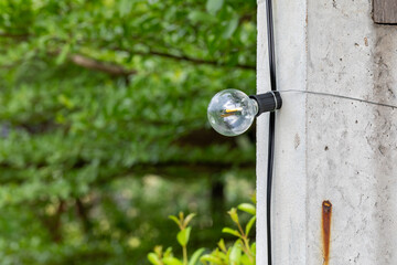 LED light bulbs are installed on cement poles.
