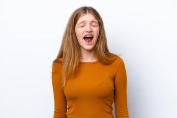 Teenager Russian girl isolated on white background shouting to the front with mouth wide open