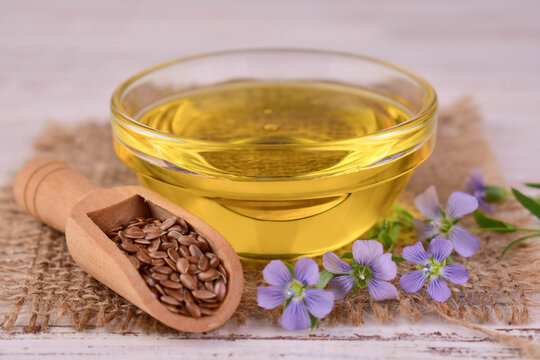Healthy flax seed oil in a glass bowl.Close-up.

