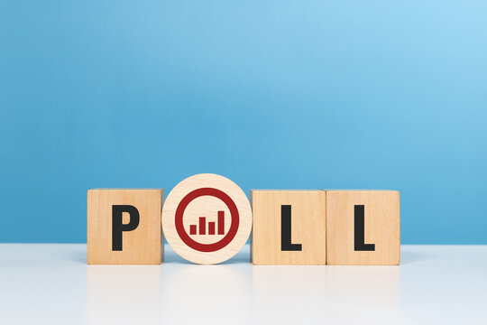 Poll,vote, election or political poll word. Wooden cubes with poll word with bar graph chart symbol at the table in the office