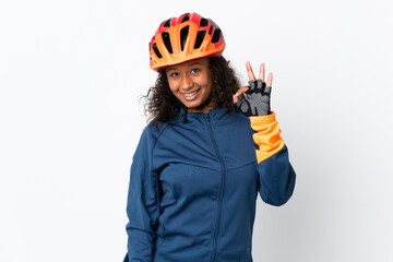 Teenager cyclist woman isolated on white background showing ok sign with fingers