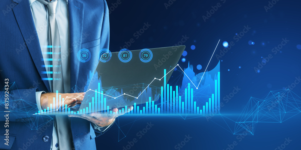Poster a man in a suit interacts with futuristic digital graphs and data projections on a blue technology-t