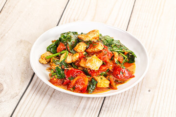 Chicken with tomato and spinach
