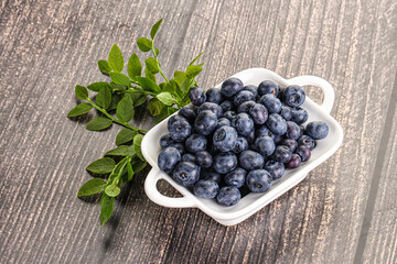 Ripe sweet blueberry in the bowl