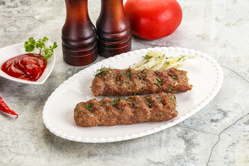 Kebab with beef served onion