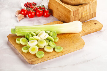 Ripe sliced leek over board