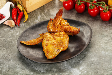 Tasty roasted chicken wing with spices