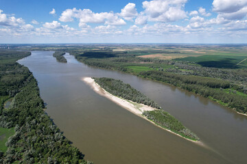 Aerial view of Danube river and Majmunsko Island on sunny day. Sremski Karlovici, Serbia.