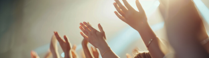 Naklejka premium Concert attendees cheering, hands raised in appreciation