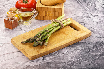 Vegan raw green asparagus heap