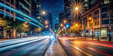 Urban street at night with car lights streaking by , traffic, night time, city, urban, vehicle, transportation, lights