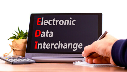 EDI electronic data interchange symbol. Concept words EDI electronic data interchange on black tablet. Beautiful white background. Business and EDI electronic data interchange concept. Copy space.