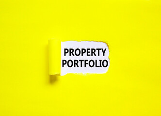 Property portfolio symbol. Concept words Property portfolio on beautiful white paper. Beautiful yellow paper background. Business Property portfolio concept. Copy space.