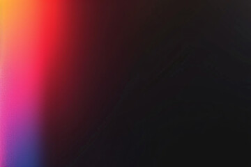 Obraz premium Gradient light in shades of red, pink, and orange on a black background with a soft, glowing effect