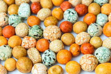 Mix of delicious glazed nuts, salty snack close up view