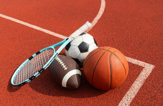 Volleyball net and different types of balls  - Powered by Adobe