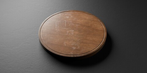 Old rustic empty round wooden cutting or chopping board on black stone background