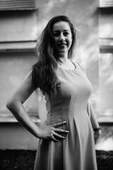 Naklejka premium Portrait of a young beautiful dark-haired girl in nature in black and white style.