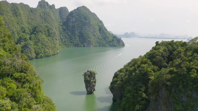 Aerial top view of Khao Phing Kan, Ko Ta Pu, Phang Nga, lush green trees from above in tropical forest in national park in summer season. Natural landscape background.