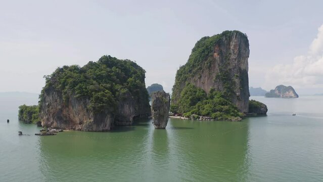 Aerial top view of Khao Phing Kan, Ko Ta Pu, Phang Nga, lush green trees from above in tropical forest in national park in summer season. Natural landscape background.