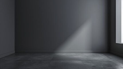 A gray wall in the corner of an empty room, with no furniture.