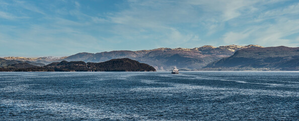 Ferry in the Norwegian fjord lands sout of Bergen