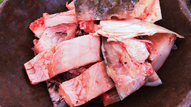 Fish pieces closeup fishmeat fishflesh cut sliced resh water scalefish machhalee, raw pesce, pescado, piece image stock photo
