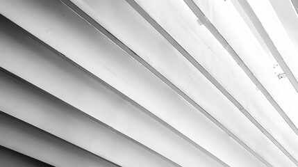 Obraz premium A white and black photo of a building with a lot of white lines