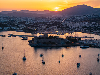 Fototapeta premium Bodrum Castle in the Summer Season Sunset Drone Photo, Bodrum Mugla, Turkiye (Turkey)